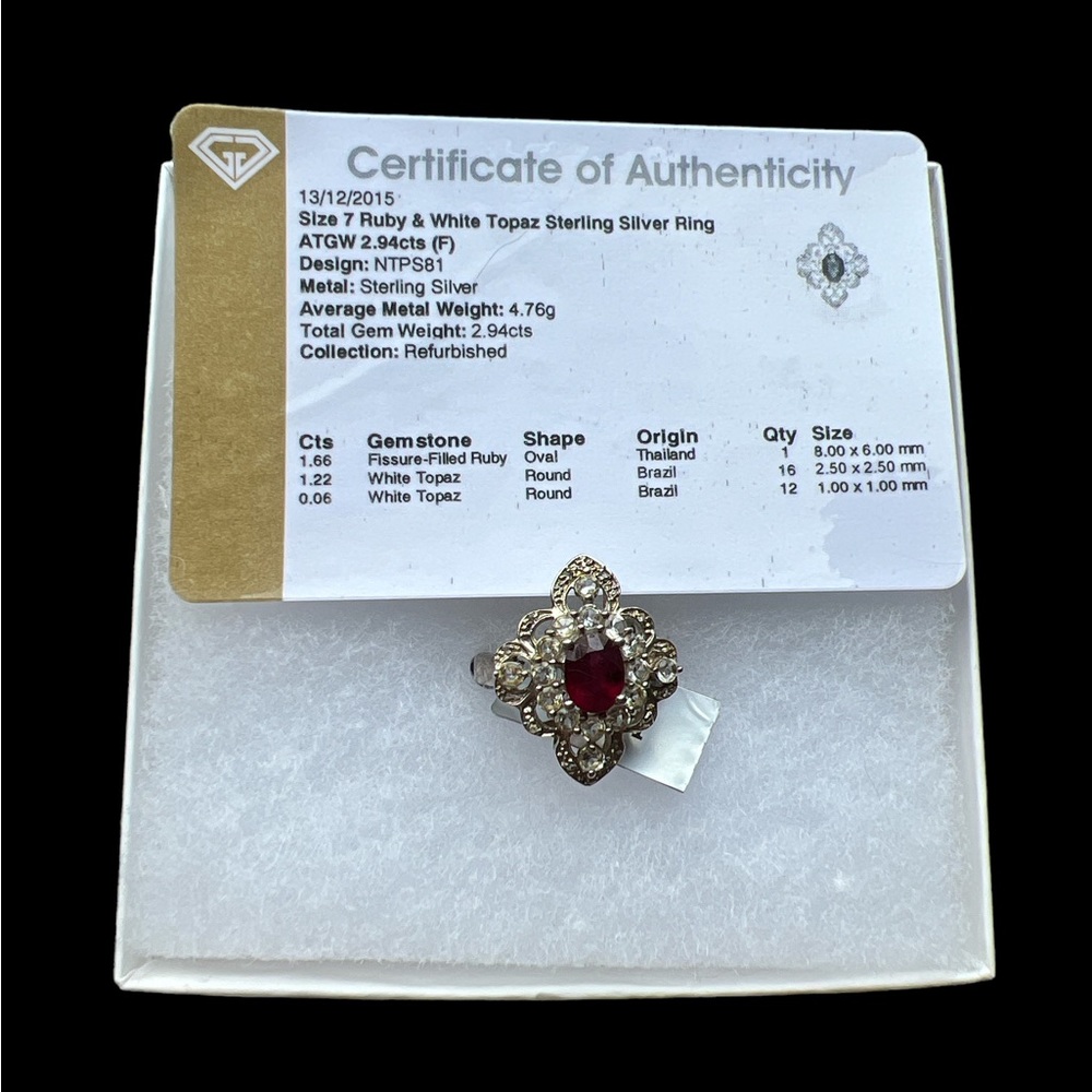 Ruby and white topaz sterling silver ring